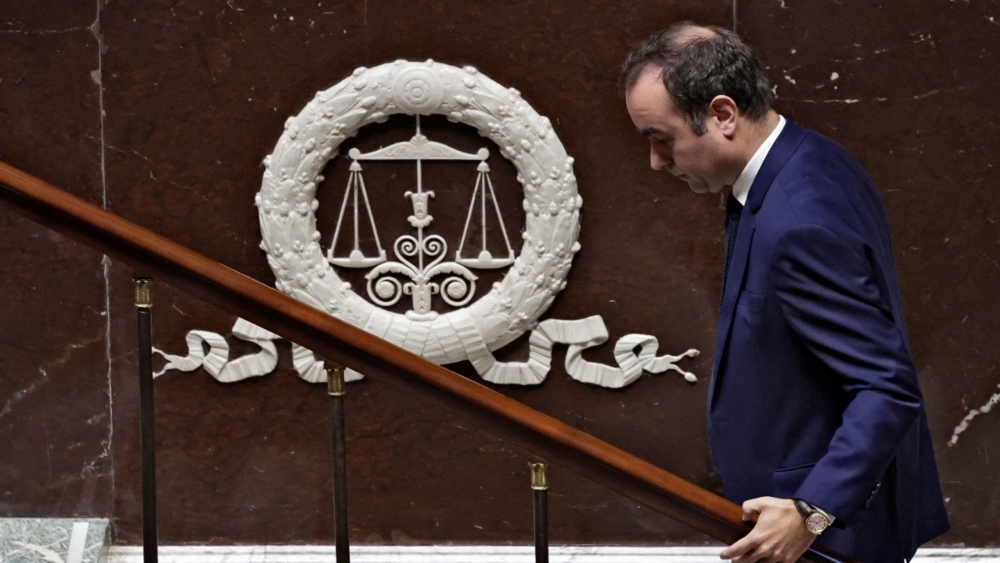 French PM survives two confidence votes days after reappointment